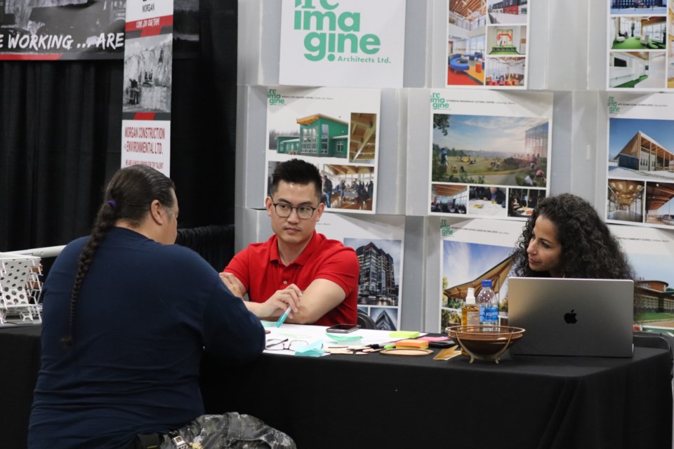 Job seekers looked for job opportunities during the Saddle Lake Career Fair and Trade Show on Aug. 25, 2022.