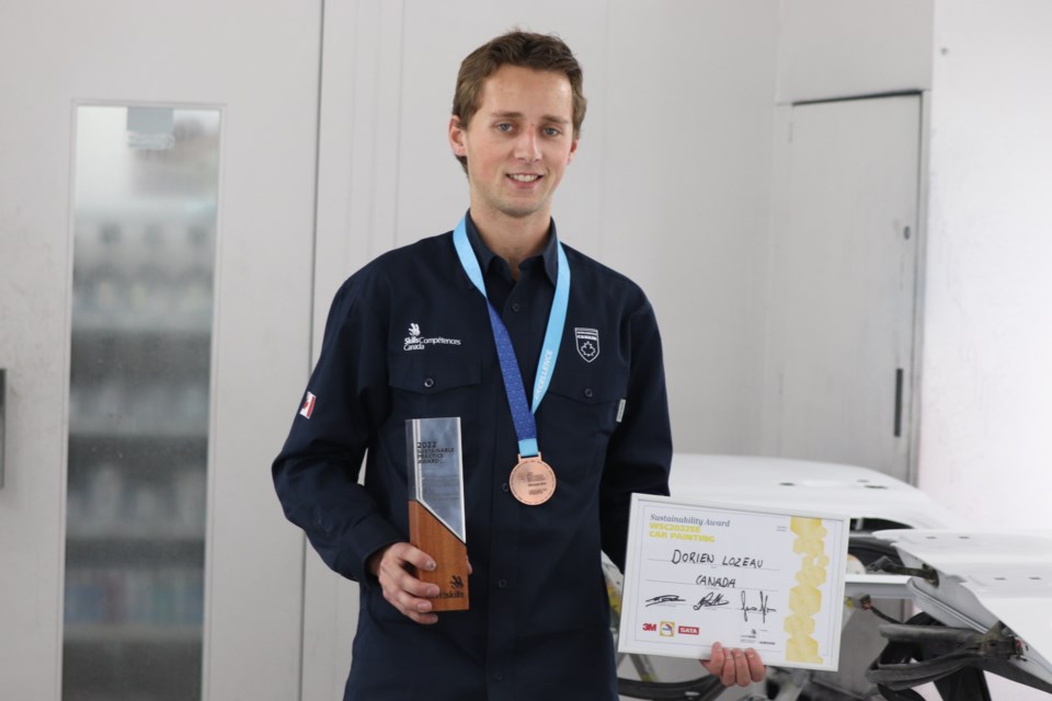 Dorien Lozeau displays his accolades acquired at the recent 2022 World Skills competition held in Denmark.