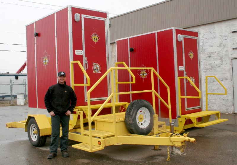 Bryan Kopala displays the King Kans, luxury portable washrooms assembled in Bonnyville.