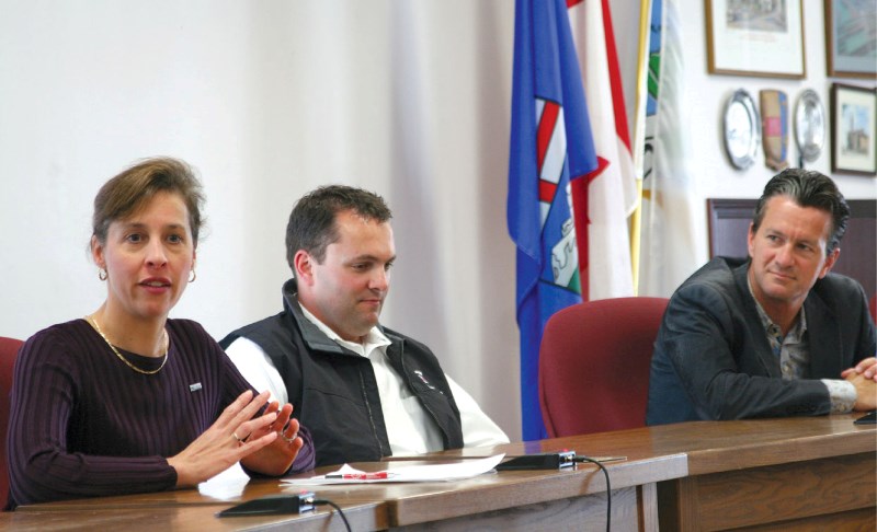 From left: U.S. Consul General Laura Lochman, Imperial Oil Resources Cold Lake operations manager Keith Chiasson, and Cold Lake Mayor Craig Copeland discuss the future of the 