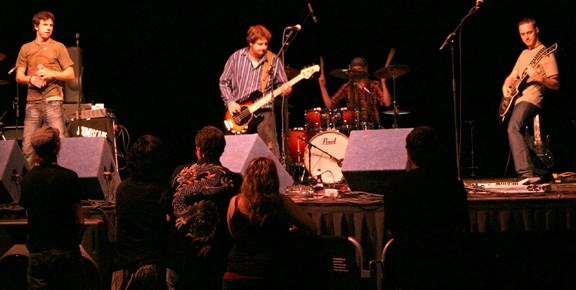 From left: Timmy Solo, Cody Anderson, Brandon Reddecliff, and Randy Bergh of Soundscape warm the crowd up before Bif Naked at the Flint Field House on July 23.