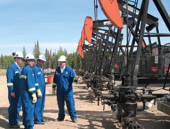 Keith Chiasson, Imperial&#8217;s Cold Lake operations manager, provides information to Laura Lochman, United States Consul General, on Imperial&#8217;s cyclic steam