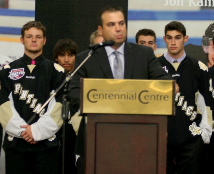 Coach Chad Mercier addresses early-morning risers at the first annual Pontiacs Education Breakfast on August 23.