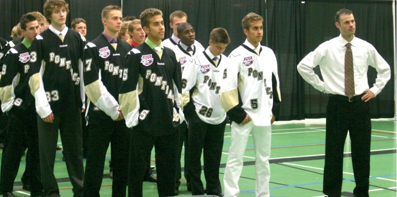 Assistant coach Ryan Pollock introduces the team at the first annual Pontiacs Education Breakfast on August 23.