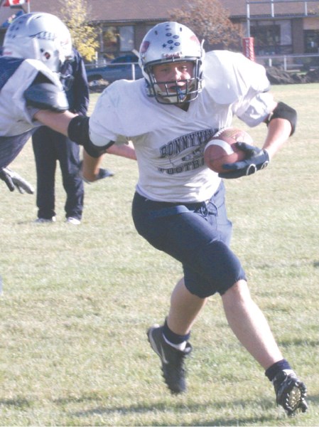 Matthew Church pushes through the defence at Voyageurs practice Sept. 28.