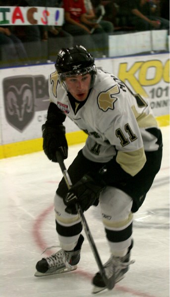 Pontiacs forward and the league&#8217;s leading scorer Matt Montesano goes searching for a puck around the Bobcats net. The Pontiacs beat Lloydminster 3-1 Friday.