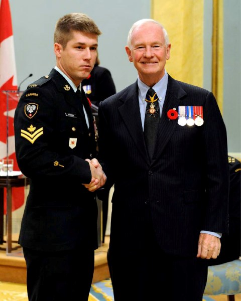 Master Corporal Paul Rachynski with Canada&#8217;s governor general, David Johnston, at a ceremony in Ottawa&#8217;s Rideau Hall Nov. 2 where he received a Medal of Military