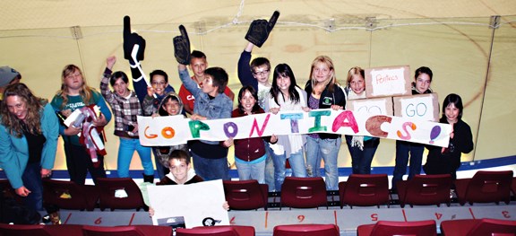 Pontiacs fans cheer on the boys at a home game last month.