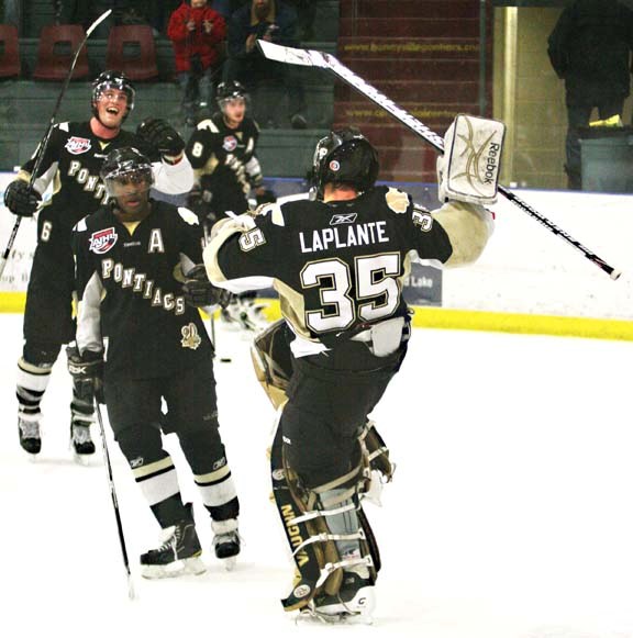 Pontiacs goaltender Julien Laplante celebrates the 1-0 win over Grande Prairie on Saturday, as teammates Kevin Carthy and Michael Westfall join him from the bench. The win
