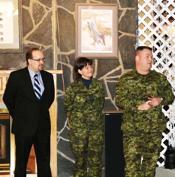 MP for Westlock-St.Paul Brian Storseth stands with Lt.-Col. Angela Banville and Major David Blackburn during an announcement of the establishment of an Integrated Personnel
