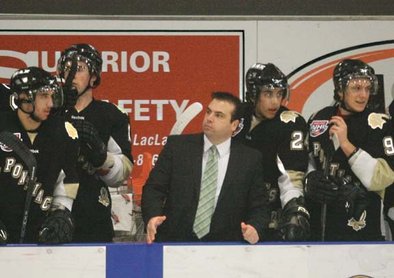 Pontiacs head coach Chad Mercier tries to get the attention of a ref to discuss a call during a game in January against Spruce Grove.