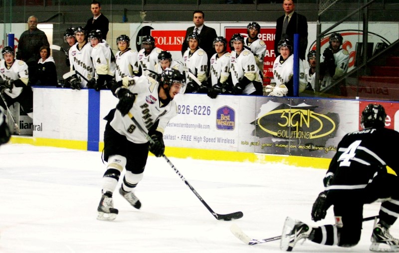 Pontiacs forward Devon Kalinski looks top corner, as he wires a shot passed the Sherwood Park defender Nov. 23. The Pontiacs face off against the Crusaders in round one of