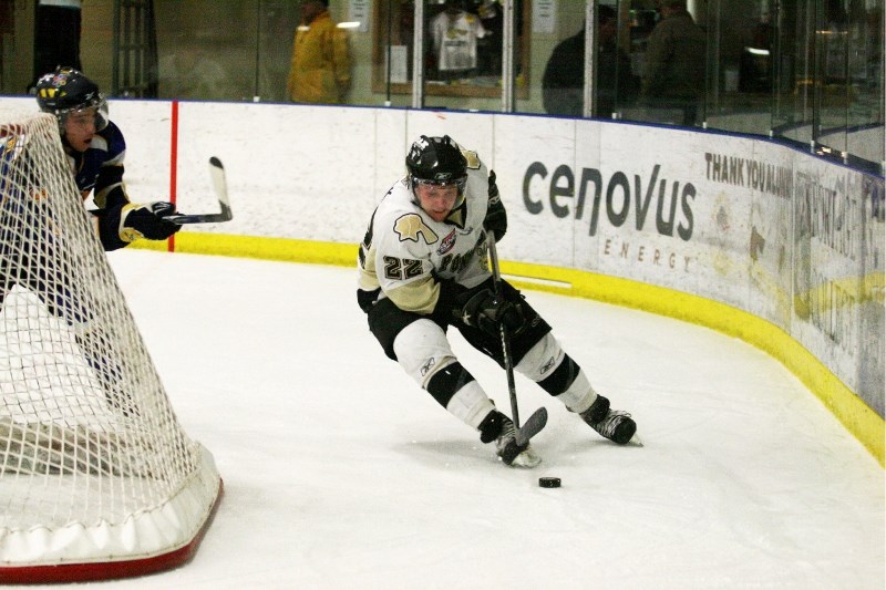 Pontiacs defenceman Blake Leask cuts around his net, to clear the zone in Wednesday&#8217;s game at the R.J. Lalonde Arena. Leask later scored the game winner in triple
