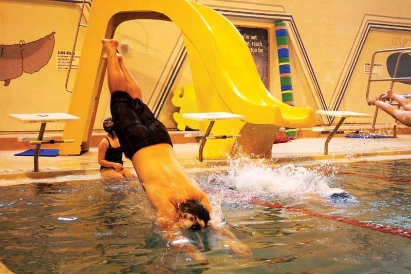 Patrick Batke dives in for a fun race at the swim-a-thon this past Wednesday.