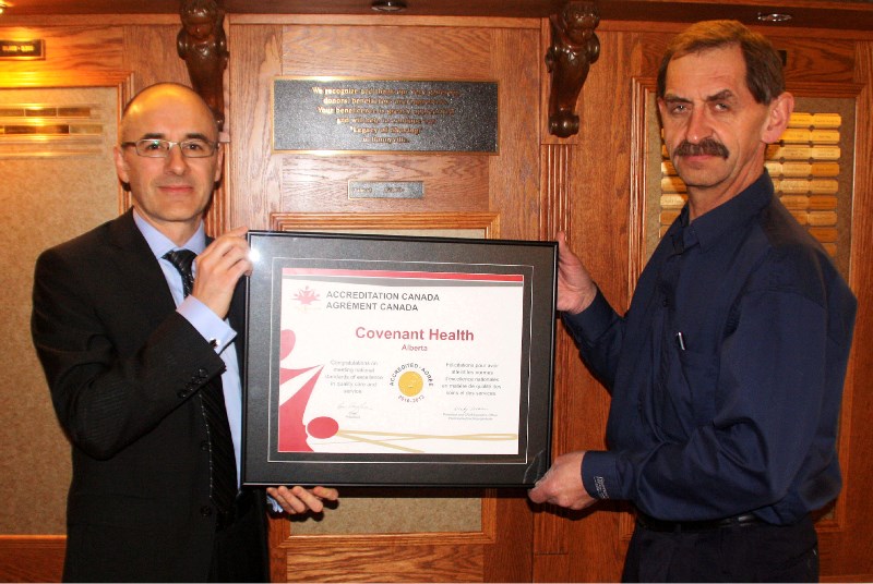 Covenant Health&#8217;s vice president of quality, Jon Popowich (left), and Bonnyville Health Centre executive director Alex Smyl show off Covenant Health&#8217;s