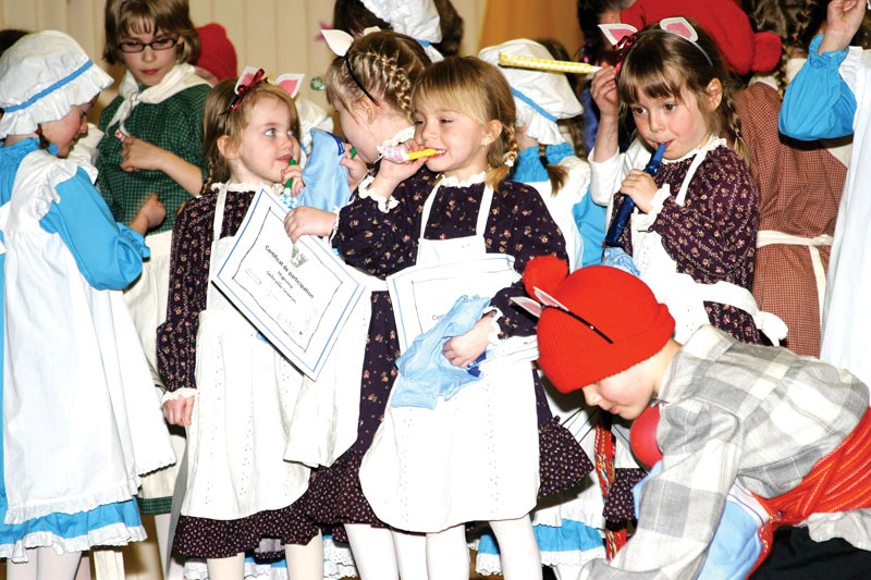 Dancers celebrate the end of their dance season after the show.