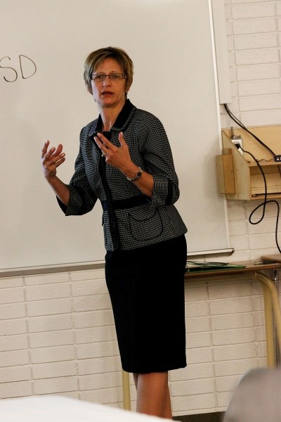 Beverley Topylki, associate superintendent of business and financial affairs, spoke about how budget cuts affect the school division.