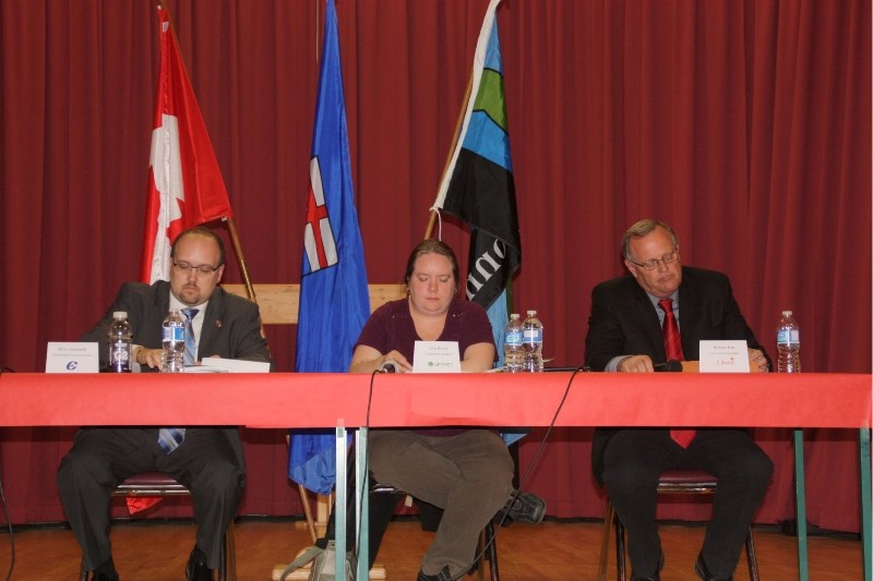 Election candidates presented their platforms and answered questions at the forum Tuesday night. From left: Conservative candidate Brian Storseth, Green Party candidate Lisa