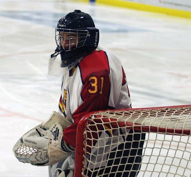 The Panthers&#8217; goalie watches his teammates chase the puck along the boards late in the third period.