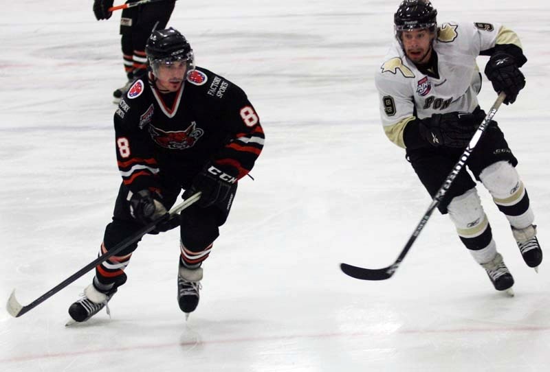 Pontiacs forward Tanner Dusyk (right) races for the puck during Bonnyville&#8217;s 2-1 shootout win over the Lloydminster Bobcats this past Tuesday.
