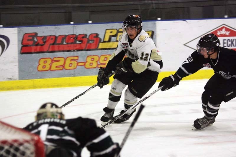 Pontiacs forward Branden Domoslai cuts in on a Sherwood Park Crusaders defender during the game this past Wednesday in Bonnyville. The Pontiacs defeated the Crusaders 4-3