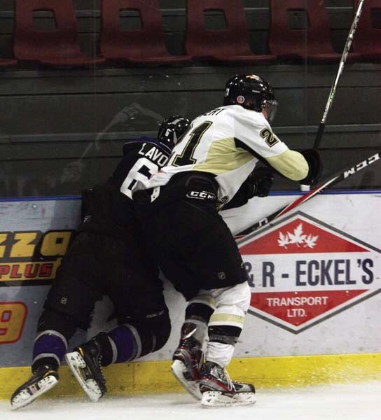 The Pontiacs ramped up the physical play against the St. Albert Steel last Saturday in Bonnyville. Pontiacs forward Austen Hebert eliminates a Steel player from the play.