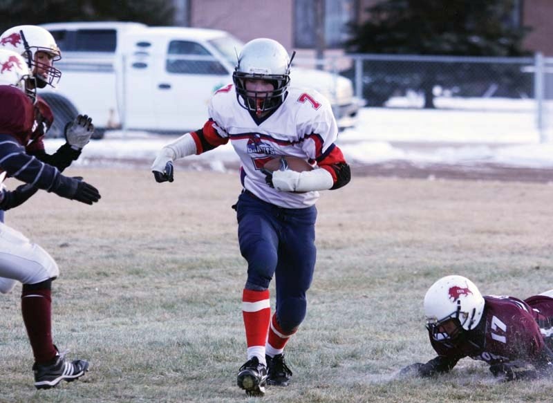 Bonnyville Bandits running back Maverick Best finds a hole between the Cochrane defenders and rumbles in for the Bandits only touchdown of the game. The Bandits lost the