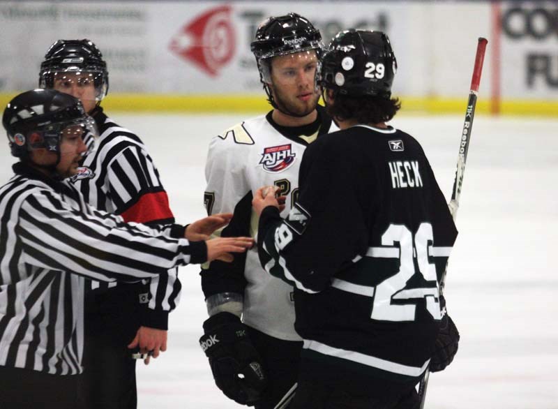 Pontiacs defenceman Chris Lijdsman making Friday-night dinner plans with Crusader JC Heck, after the Sherwood Park defenceman made several questionable hits in limited