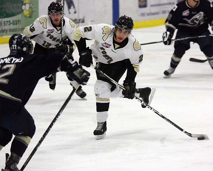 Pontiacs forward Dallas Ansell rips a shot on net. The Saints beat the Pontiacs 4-3 in O.T. last Tuesday in Bonnyville.