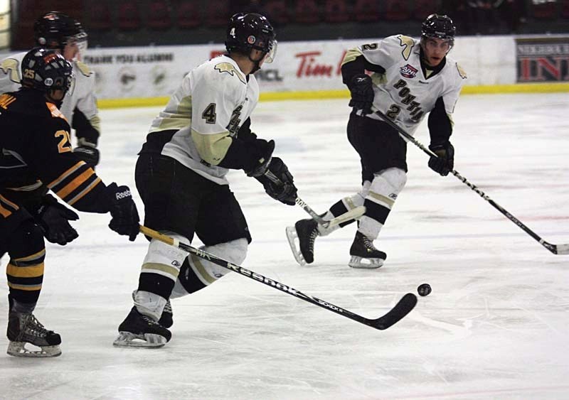 Sixteen-year-old Pontiacs defenceman Colton Waltz (4) sets up teammate Dallas Ansell (2) in the slot during Saturday&#8217;s 6-3 win over the Grande Prairie Storm. Ansell