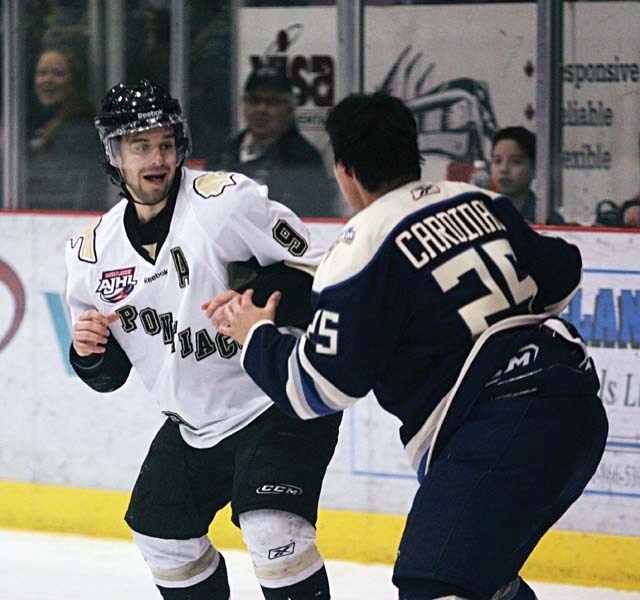 Bonnyville Jr. A Pontiacs forward Tanner Dusyk drops the gloves with Grande Prairie defenceman Thomas Ward Cardinal during the teams&#8217; Feb. 1 matchup in Grande Prairie.