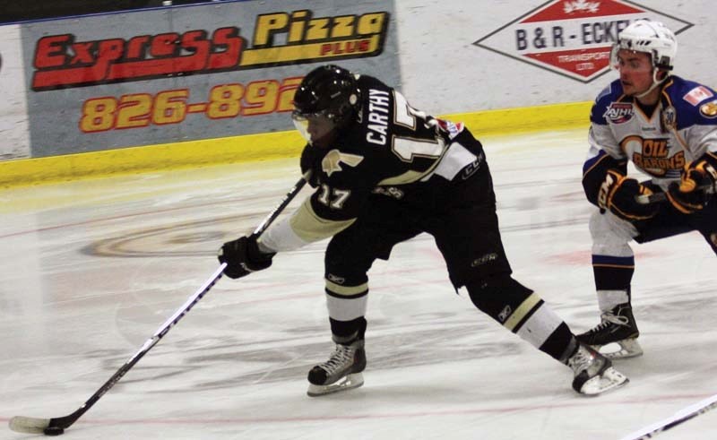 Jr. A Pontiacs co-captain Kevin Carthy gets past the Fort McMurray defencemen for a breakaway Friday&#8217;s game in Bonnyville. Carthy made his return to the lineup in the