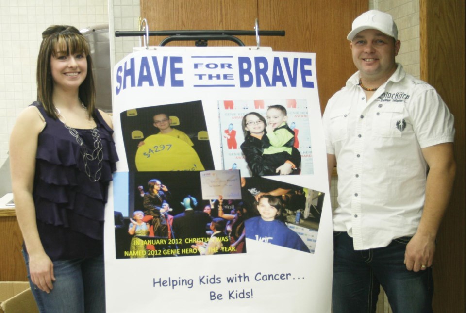 Joanne and Trevor Legge, father and step-mother to Christian, help raise money for Christian who is shaving his head for the sixth time for Shave for the Brave.