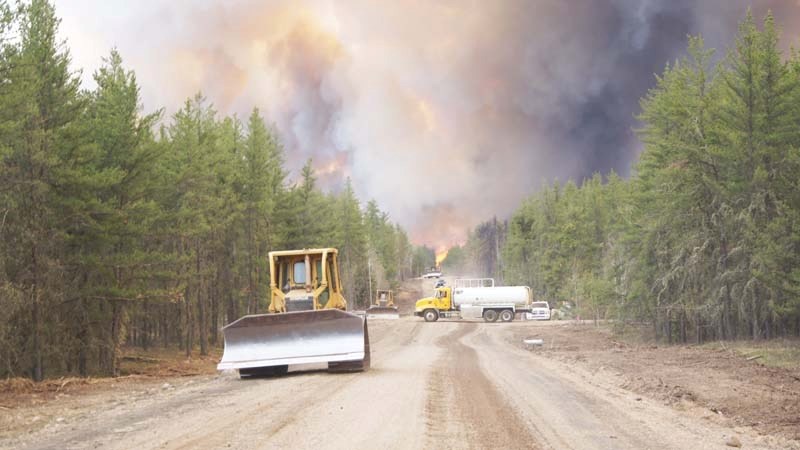 Firefighters have worked day and night since fire broke out in the Forsythe Lake area May 13, finally changing the status of the fire from &#8220;out-of-control&#8221; to