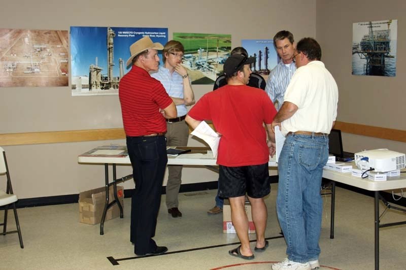 Crane Lake residents ask about the proposed Birchwood oilsands extraction project that would be located near Crane Lake and the surrounding community during an open house and 