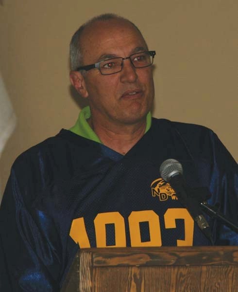 Brian Walsh, retiring teacher and coach at Notre Dame High School, gives a thank-you speech during his retirement party at the Fish and Game Club hall on Friday night.