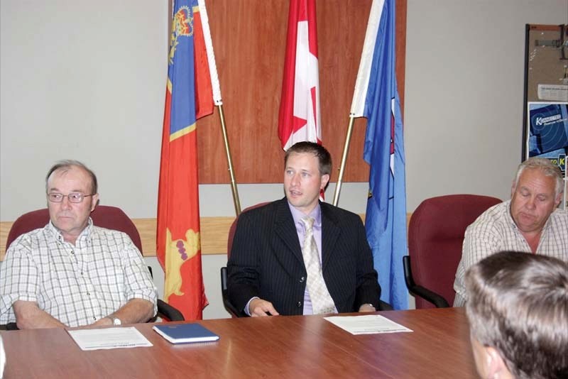 Cold Lake RCMP Constable Dan Kehler, of the General Investigations unit, answers questions at a recent press conference regarding the ongoing criminal investigation of the