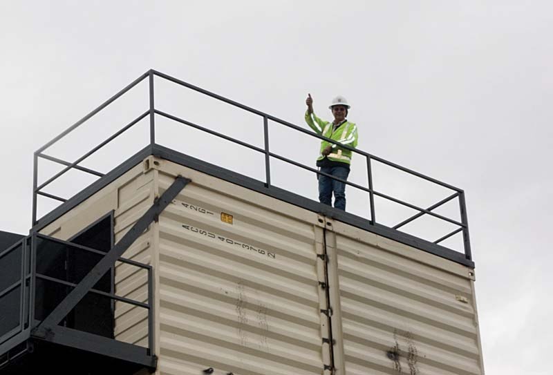 Brian McEvoy, fire chief of the Bonnyville Regional Fire Authority, stands on top of the four-storey tower that is part of the live fire training building.