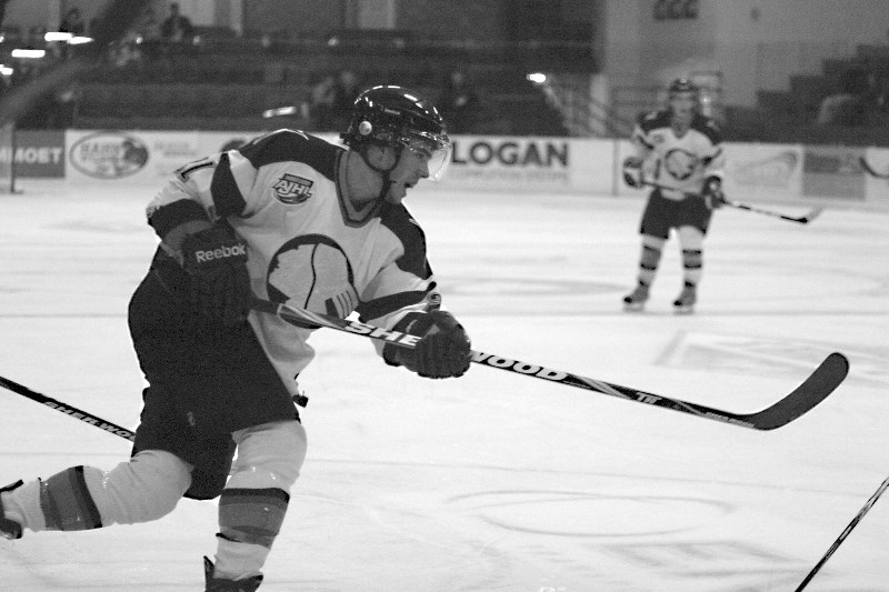 Forward Austen Hebert rips a shot on net during the Pontiacs exhibition game against Portage College this past week.