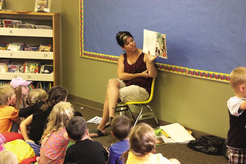 These kids search for back to school items during a scavenger hunt at the Bonnyville Municipal Library for the Back to School story time event held on Aug. 28. (Above right)