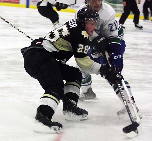 Pontiacs forward Locke Muller drives to the net in search of a rebound during the game against the Calgary Canucks this past Friday at home. Muller picked up a foal and four
