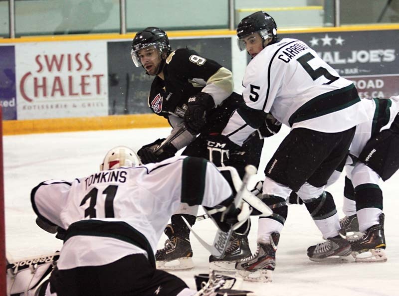 Pontiacs forward Tanner Dusyk (9) just misses putting the puck top shelf on Sherwood Park Crusaders goalie Matt Tomkins on Sept. 19. Dusyk was suspended for two games after a 