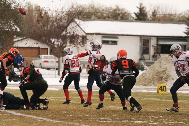 Quarterback Reid Skrypichayko throws a pass towards the endzone, helping propel the Bandits to a victory against the St. Paul Bengals.