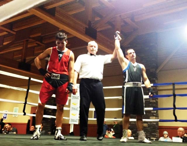 Local boxer Mark Fieger, fighting out of KA Boxing Club in Bonnyville, is awarded one of his two victories on his way to winning his weight class at the Bronze Gloves