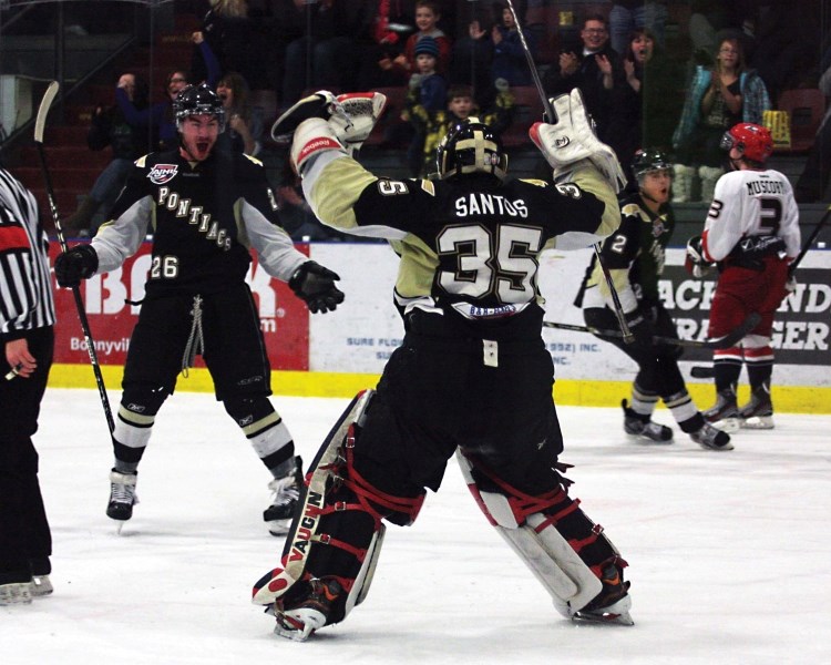 After making the game-winning save in the shootout to beat the Brooks Bandits Saturday in Bonnyville, Pontiacs goalie Tyler Santos shows his emotions as he meets teammate Tom 