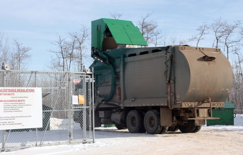 An MD of Bonnyville garbage truck picks up garbage from the Chatwin Lake waste transfer site on Feb. 22. Notices posted by the MD at the site indicate it will be temporarily