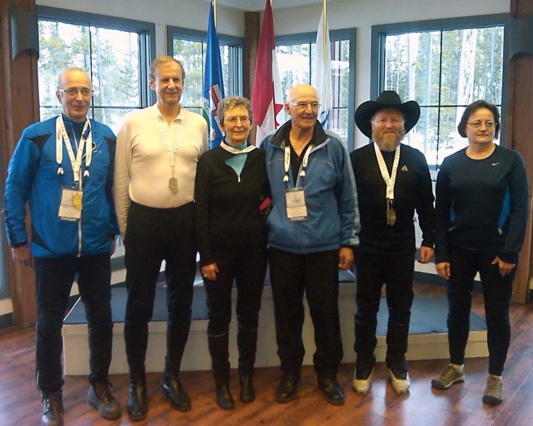 The Zone 7 cross-country ski team, made up of skiers from Bonnyville and Cold Lake, gathers for a photo following the 55-plus Winter Games medal ceremonies. Pictured from