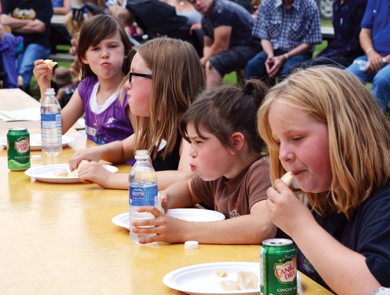 (Left to right): Felicity, Shayla, Hadashah and Hannah compete in the festival&#8217;s pyrogy eating contest.