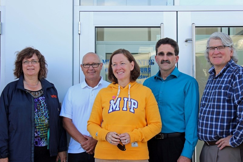 Calgary-Glenmore MLA Linda Johnson, Grande Prairie-Smoky MLA Everett McDonald, Premier Alison Redford and Edmonton-Gold Bar MLA David Dorward (right) visited Mayor Glenn