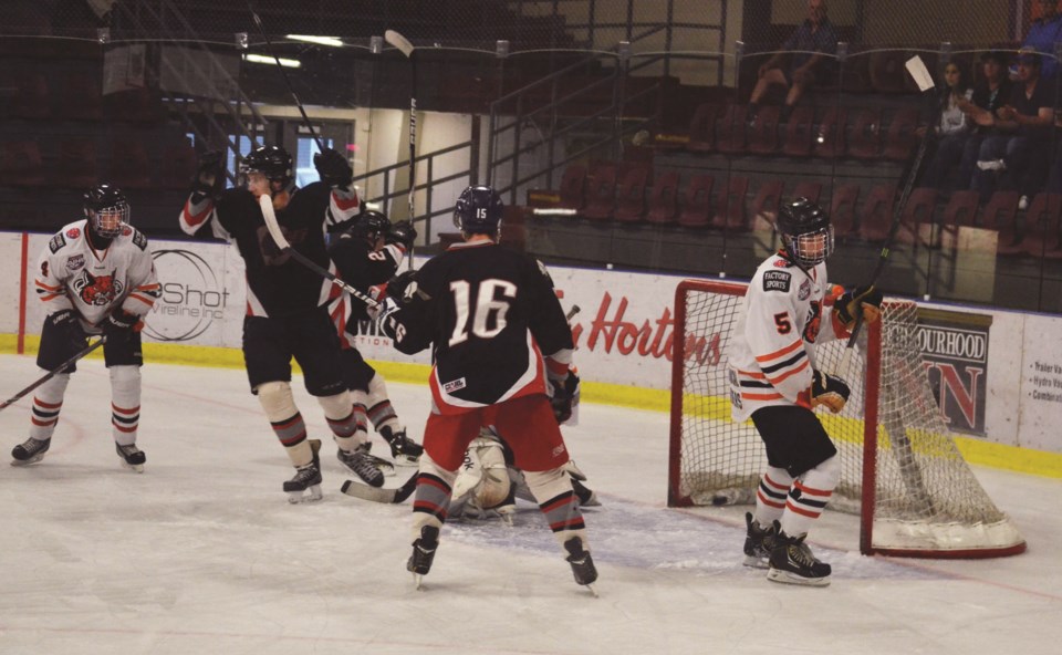 The Pontiacs celebrate Alex Smith&#8217;s first period goal on Aug. 27 versus Lloydminster. Bonnyville went on to win 3-2 in overtime.